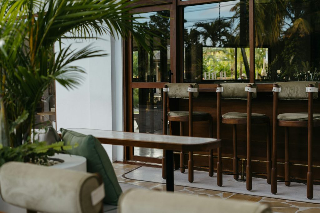 A living room filled with furniture and a bar