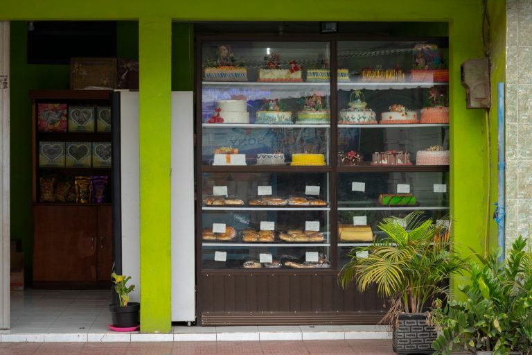 Cakes displayed on window display rack