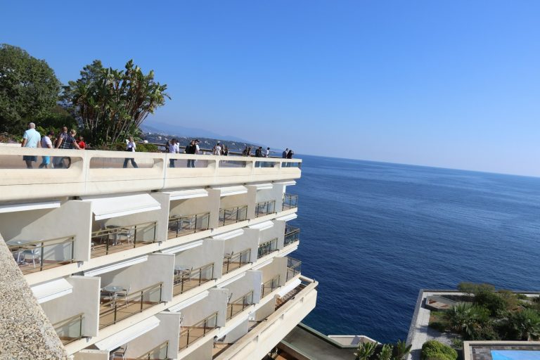 Hotel balconies overlooking the deep blue sea